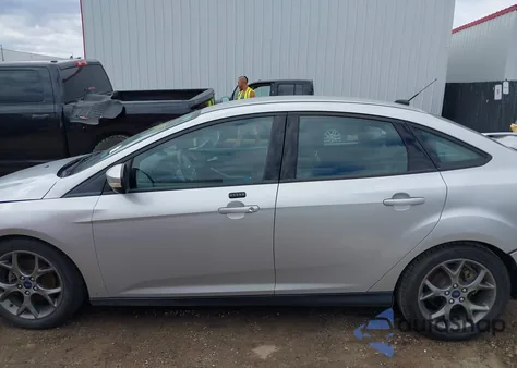 2014 Ford Focus Se z USA, uszkodzony, nr VIN 1FADP3F21EL320009